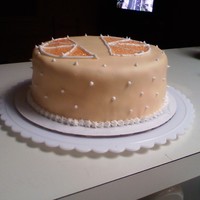 Simply Orange OrangeDreamsicle Cake with matching exterior theme!