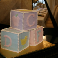 Baby Blocks three 6" blocks, three layers each. All buttercream icing and decorations.