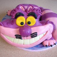 Cheshire Cat - From Alice In Wonderland This was my first sculpted cake, the cake was red velvet.