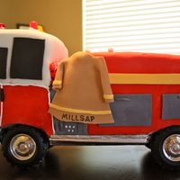 Free-Standing Fire Engine With Hose Bed Wheels are off a toy engine, axles mounted to wooden base covered in fancy foil and stabilized with dowels behind each wheel. (You could...