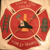 Fire Department Maltese This was hand-carved from two layers of 18" rounds...a lot of cake! :)White edging is RI, as is the writing for a retiring member of...