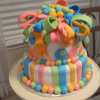 Color Explosion! This is a cake I made for my daughter's 14th Birthday. The icing is homemade Marshmallow Fondant. I