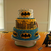 Jordan's Batman Cake This was created for my son's 3rd Birthday. City buildings are piped buttercream. Batman emblems were a labor of love-hand cut from...