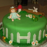 Fairy Garden Fondant and gumpaste decorations, buttercream accents.