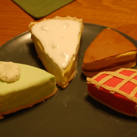 Pie Cupcakes I made these little guys using a scone pan and then covered in MMF to look like Lemon Meringue, Key Lime, Boston Cream and Cherry Lattice...