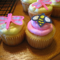 Mini Garden-Themed Cupcakes The dragonflies and bees were made of royal icing.