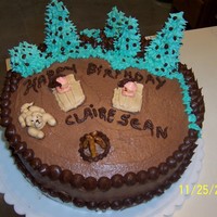 Camping Two children wanted a camping themed cake with their dog added in it.