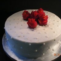 Strawberry Roses Roses carved from strawberries. Yellow cake with buttercream frosting