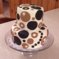 Black And Tan Joint birthday cake for my Dad and Grandmother. Key lime with raspberry filling. This is my first tiered cake. It was fun to make and the...