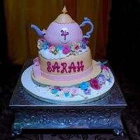 Sarah's Tea Pot Cake Saw a picture for this idea and loved it so we tried to duplicate it. We actually made it a little more sophisticated but kept it child-...