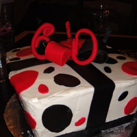 Happy 60Th! The cake was suppose to be tapered a little more. The colors were inspired by the Univ. of Georgia.