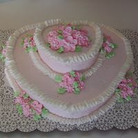 Two Tiered Heart Cake First time doing the ruffle border....I guessed at it. :)