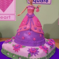 Barbie Cake This cake was made for a friends little girl's 4th birthday. The base cake is a Sunny D flavored with buttercream and fondant. The...
