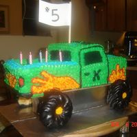Monster Truck This was for my nephew's 5th birthday. The tires are honey kruellers from Tim Horton's that I covered in chocolate ganache.