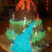 Dinosaurs And Volcano All buttercream. My son's 5th birthday cake. I think it turned out pretty good.