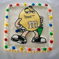 Yellow M&m Chocolate cake with peppermint buttercream. M&M is fbct.
