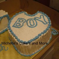 Baby Bib This was with the Baby blocks No filling just yellow cake and alot of vanilla and milk used went I did the frosting. Thank you for looking...