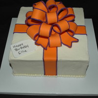 Orange & Purple Present Birthday present cake with Orange and Purple bow by request.