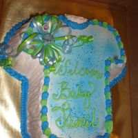 Jamil T Shirt Baby Shower Cake Yellow cake with chocolate filling. Thank you for looking comments are always appreicated. Michelle :-)