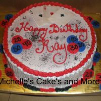 Ray's Birthday This cake is Yellow with strawberry filling. Foundant accents . The cards are made with foundant and rice paper. drawn with edible wilton...