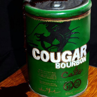 Cougar Bourbon Can This is 5 x 6 inch rounds alternating between chocolate cake and pumpkin chocolate chip cake filled with my own pecan praline buttercream...
