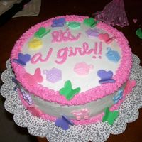 Butterfly Baby Shower This is a white cake w/ bc. The butterflies are fondant then I added some baby shower trinkets! Oh...and please excuse my messy table!! Lol...