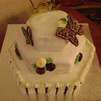 3 Tiers For 3 Birthdays This cake was designed for a party to celebrate 3 birthdays in one day. The cake is french vanilla. The top, and bottom tiers have a...