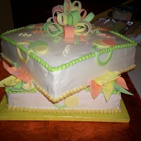 Shower Cake Carrot cake with cream cheese icing. My first time making a bow and working with this kind of cake and gum paste.