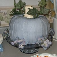 Blue Pumpkin Cake This was a chocolate cake made from two bunt pan cakes. Edible glitter gave it some sparkle with the pastel color for the baby shower for...