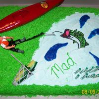 Fishing Theme hi all !! i am new to decorating and i am self taught. this is the first cake i ever decorated. i used grass tip and it is a butter cake...