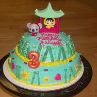 Ni Hao Kai-Lan I found the toys at Target, and just designed the cake around them.