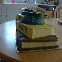Stacked Books And Grad Cap 2 of my Nephews graduated at the same time.