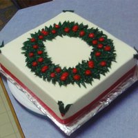 Christmas Wreath Cake Keylime cake with all buttercream icing. Real ribbon around the bottom