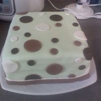 Polka Dot Cake Attempt number two. The fondant was a little thin, so the cake was kind of lumpy. I took a rectangular cake and trimed it to square.
