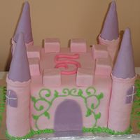 Castle Cake Made for a 5 year old. Rice Krispy Treats for the towers, Ice Cream Cones for the roofs...