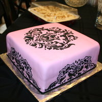 Damask Stenciled Cake Chocolate Cake with Chocolate Frosting, Pink MMF. Damask Stencil in Black Royal Icing.