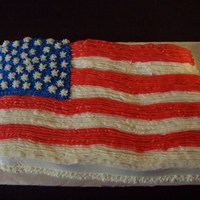 Old Glory Flag Cake Cake made using Wilton's flag cake pan. Cake is made with buttercream icing and used tip #16.