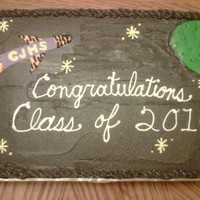 Space Themed Graduation Cake Sheet cake made for our school's space themed Pre-K graduation. School colors are purple and gold w/ tiger mascot, so made the rocket...