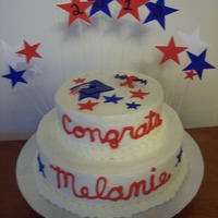Patriotic Graduation Cake Cake is a 2 layer 12 inch round and 2 layer 8 inch round, 2 tier cake.Graduation cake for a school that has a Patriot mascot and colors of...