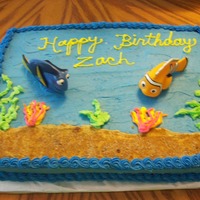 Finding Nemo Birthday Cake 1/4 sheet cake of Disney's Finding Nemo. Seaweed was made using leaf tip. Sand was made using brown sugar.