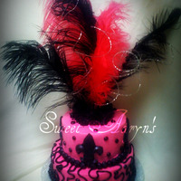 Fleur De Lis Hot Pink and Black buttercream icing. Fondant accents. Triple fudge cake. TFL.