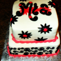 Modern Birthday Yellow cake with buttercream icing and fondant accents. TFL