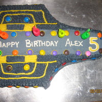 Rocketship Birthday Cake Chocolate cake with buttercream icing and smarties. Birthday boy picked the shaped pan. Not my personal favorite but, the birthday boy was...