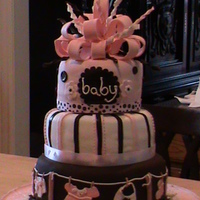 Pink And Brown Polka Dots, Stripes Clothes Line Baby Shower baby pink and chocolate brown baby shower cakewith polka dots, stripes, and a giant loopy bow! Clothes line & clothes made of fondant....