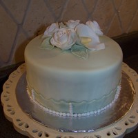 Nothing Special 6" WASC and Chocolate. Fondant covered (gotta work on NOT covering a cold cake!) gumpaste roses and calla lily - for practice