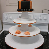Wedding Shower this is Duff's chocolate cake mix with raspberry filling, 6 inch cake-I made this cupcake stand - orange and black are the colors for...