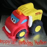 Tonka Truck This is a chocolate mudcake covered in white truffle chocolate and fondant. All edible. I started with an 8inch square cake and carved from...