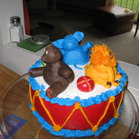 First Birthday Cake This was the very first cake I made and it was my son's first birthday cake. First time with gumpaste too! I have learned a lot since...