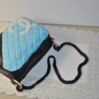 Chanel Purse I made this cake for a friend who loves purses. Made with Jen Dontz's fondant recipe.
