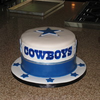 Dallas Cowboys Chocolate cake with peanut butter SMBC filling, covered in fondant. Had some issues with the airbrushing. Had to leave some pieces to...